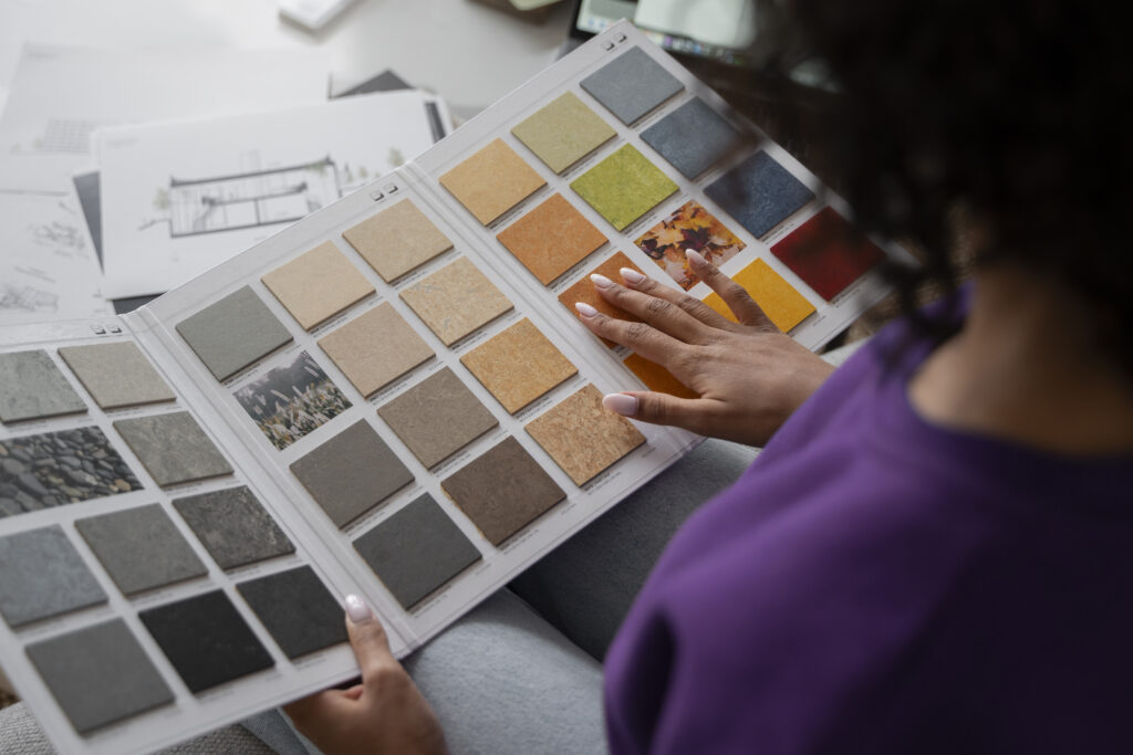 Interior designer selecting wall textures, emphasizing variety and quality of materials